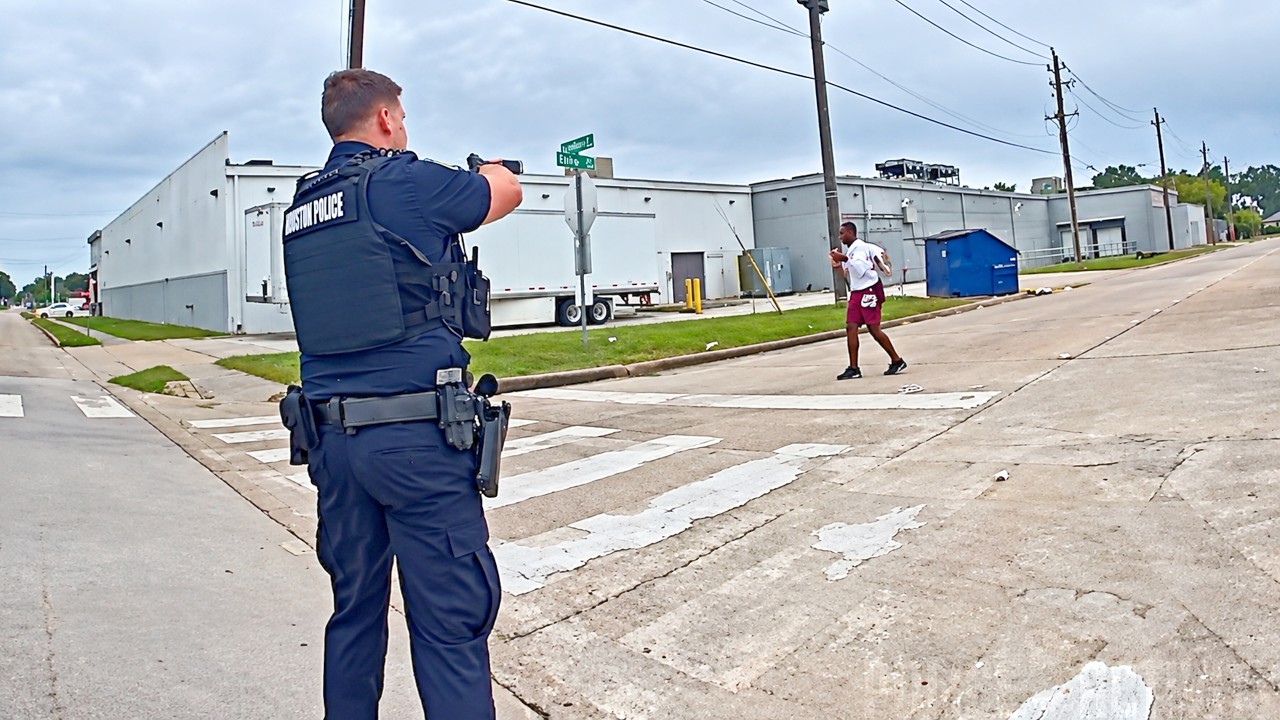 Houston Officers Shoot Woman After She Points Gun at Them